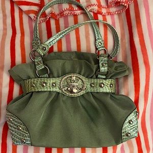 Authentic Kathy van zeeland green Hand bag.